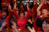 KEN GIGLIOTTI / WINNIPEG FREE PRESS
Annette and husband Dennis Lafreniere were among many at the St. Vital Curling Club celebrating Canada's gold-medal win in Olympic women's curling Thursday morning.