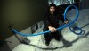 Phil Hossack / Winnipeg Free Press 
Ryan Black holds the hose he uses to get water from one of his neighbours. He has been without water since Jan. 31.