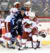 Boris Minkevich / Winnipeg Free Press
Winnipeg Jets Mark Scheifele gets ambushed by a pack of Phoenix Coyotes. Winnipeg Jets game at MTS Centre.