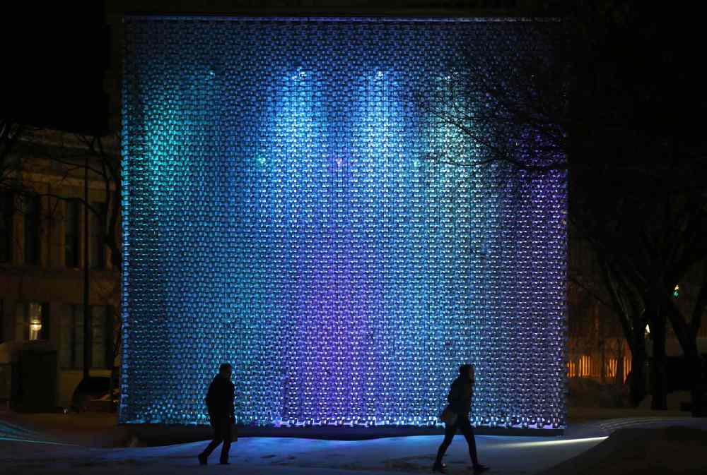 Trevor Hagan / Winnipeg Free Press
People walk through Old Market Square past The Cube in Winnipeg's Exchange District.