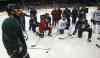 JOE BRYKSA / WINNIPEG FREE PRESS
Dustin Byfuglien (left) and teammates get some instruction at practice Monday at the MTS Centre. The Jets take on the Islanders tonight.