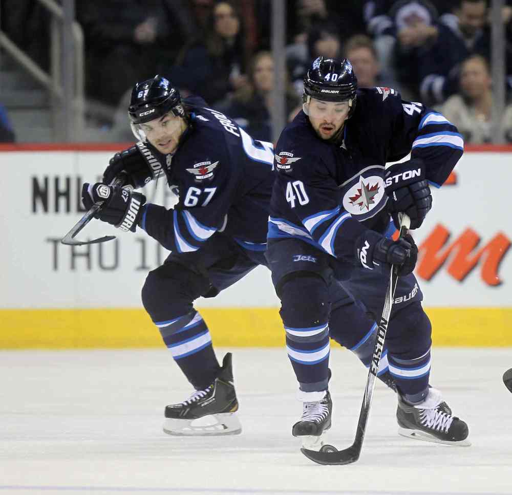 Phil Hossack / Free Press files
The Jets are likely to ice the same lineup Saturday which keeps Michael Frolik, left, at centre.