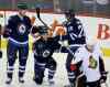 TREVOR HAGAN / WINNIPEG FREE PRES
Winnipeg Jets' Jacob Trouba (8), Bryan Little (18) and Blake Wheeler (26) celebrate as Ottawa Senators' Colin Greening (14) looks on after Little scored during first period NHL hockey action at MTS Centre in Winnipeg Saturday.