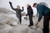 John Woods / Winnipeg Free Press 
Susan McVarish cheers Monday as Good Samaritans Murray Greenley (centre) and Del Comerbach remove a windrow in front of her garage in the back lane of Helmsdale Avenue.