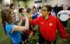 KEN GIGLIOTTI / WINNIPEG FREE PRESS
Desiree Scott, member of Canadian women's national team and Olympic bronze medallist, gives high-fives to Grade Six students from Edmund Partridge Community School. Provincial, city and soccer association officials were on hand to announce funding for a new FIFA-sized indoor soccer facility in north Winnipeg.