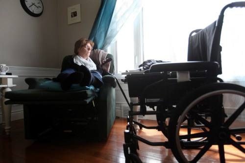 Ruth Bonneville /  Winnipeg Free Press
Bev Bungay reclines in her specialized chair with her cane by her side as she slowly recovers from an accident in which she broke 11 bones after being hit by a car. She shared her story as part of the Winnipeg Free Press' series on traffic safety.