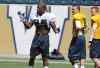 Jason Halstead / Free Press files
Winnipeg Blue Bombers RB Kevin Smith (left) takes part in football practice at Investors Group Field last Thursday.