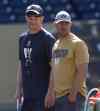 JOE BRYKSA / WINNIPEG FREE PRESS 
Head coach Mike O’Shea (left) and GM Kyle Walters were keen observers at training camp Wednesday.