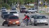 JOE BRYKSA / WINNIPEG FREE PRESS
A cyclist rides at Bishop Grandin Boulevard and Pembina Highway Thursday afternoon.