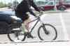 Joe Bryksa / Winnipeg Free Press
A Cyclist navigates through heavy traffic at Bishop Grandin Boulevard and Pembina Highway Thursday afternoon. On Monday, a cyclist died after being hit by a car on his way to the Winnipeg Blue Bombers game.