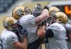 JOE BRYKSA / WINNIPEG FREE PRESS 
Bombers Carl Fitzgerald, Patrick Neufeld, and Paul Swiston work in practice Tuesday at Investors Group Field.