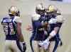 Phil Hossack / Winnipeg Free Press
Winnipeg Blue Bombers #19 Aaron Kelly and quarterback Drew Willy celebrate the second of Kelly's TDs in the first quarter Thursday at Investors Group Field in WInnipeg as #81 Cory Watson looks on.