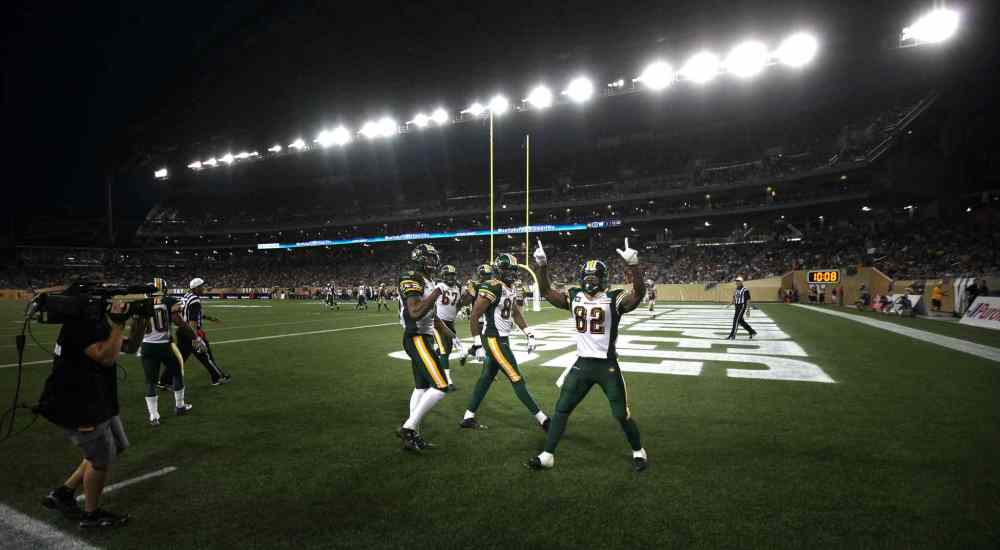 Phil Hossack / Winnipeg Free Press
Edmonton Eskimos' #82 A.J. Guyton celebrates his touchdown late in the third quarter against the Winnipeg Blue Bombers Thursday evening at Investors Group Field.