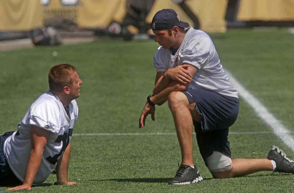 Joe Bryksa / Winnipeg Free Press'
Injured punter Mike Renaud, right, chats with kicker Lirim Hajrullahu during practice Monday afternoon at Investors Group Field.
