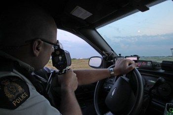 JOE BRYKSA / WINNIPEG FREE PRESS
Cpl. Mark Hume is on the job catching speeders on the Trans-Canada Highway near Portage la Prairie. He’s alarmed by the number of people who drive more than 30 km/h over the speed limit.