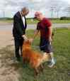 Ken Gigliotti / Winnipeg Free Press
Gord Steeves talks with Robert Bagnercy and his dog Tucker near a dog park along the Parker lands — where the second leg of rapid transit would run — at Hurst Way.