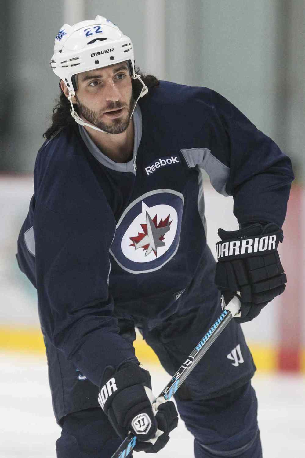 MIKE DEAL / FREE PRESS files
Chris Thorburn hits the ice for a pre-training camp practice Monday morning.