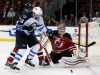 TREVOR HAGAN / WINNIPEG FREE PRESS
Winnipeg Jets' Andrew Ladd (16) battles with New Jersey Devils' Marek Zidlicky (2) in front of goaltender Cory Schneider (35) during first period NHL hockey action at the Prudential Center in Newark, N.J., Thursday.