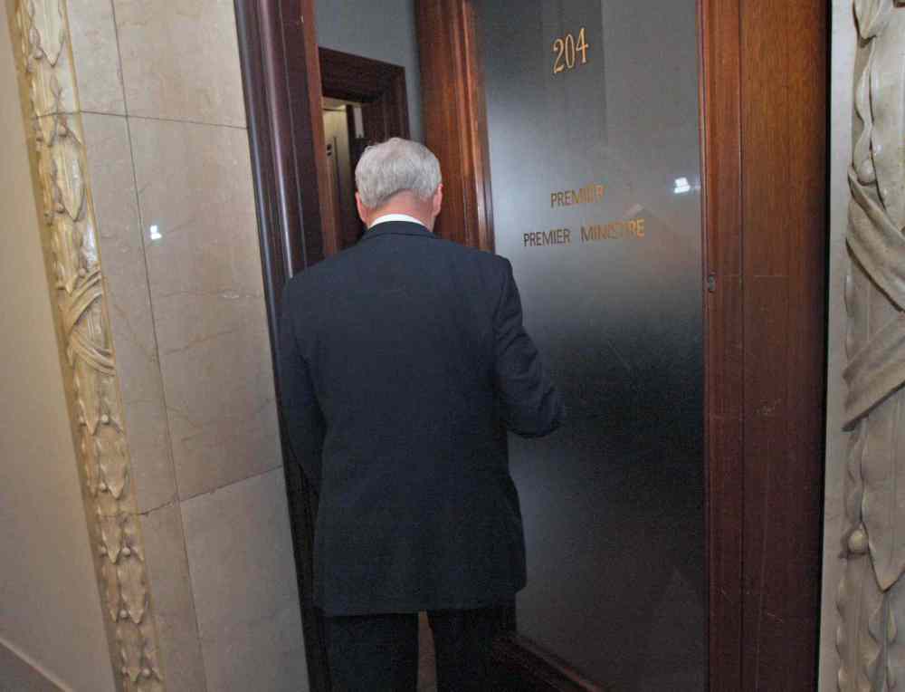 JOE BRYKSA / WINNIPEG FREE PRESS
After a turbulent day with five senior ministers resigning from cabinet Premier Greg Selinger heads to his office after a ceremony where five new cabinet ministers were sworn in at the Manitoba Legislature Monday afternoon.
