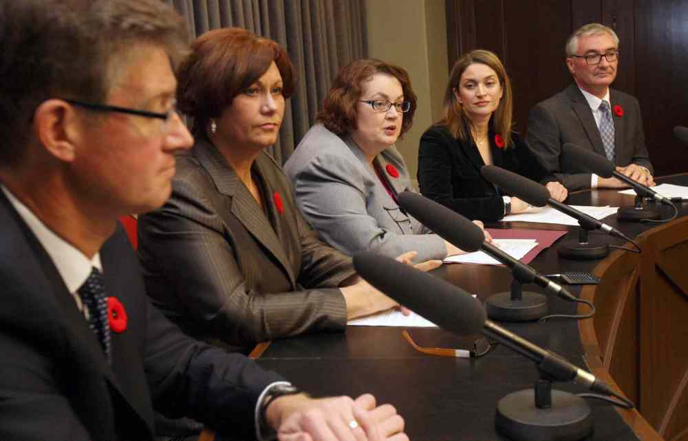 JOE BRYKSA / WINNIPEG FREE PRESS
Theresa Oswald (from second left), Jennifer Howard and Erin Selby, flanked by Andrew Swan (left) and Stan Struthers, were the backbone of the bid to oust Greg Selinger.