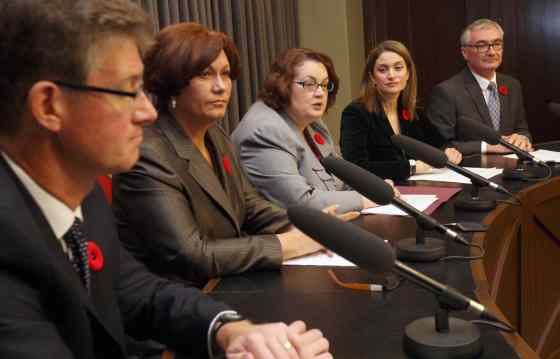 JOE BRYKSA / WINNIPEG FREE PRESSTheresa Oswald (from second left), Jennifer Howard and Erin Selby, flanked by Andrew Swan (left) and Stan Struthers, were the backbone of the bid to oust Greg Selinger.