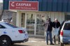 BORIS MINKEVICH / WINNIPEG FREE PRESS
Police removed computer equipment Wednesday from the Caspian construction company at the centre of an RCMP investigation into the Winnipeg Police headquarters building.