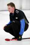 TREVOR HAGAN / WINNIPEG FREE PRESS
Braden Calvert watches his shot during a match last week at the 2015 Junior Provincial Curling Championships at the Assiniboine Memorial Curling Club.