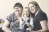 RUTH.BONNEVILLE@FREEPRESS.MB.CA 
Elise Gottzmann-Cummings is all smiles as she sits with her mom, Mackenzie Cummings (right), and insurance agent Cheryl Gibson.