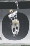 NICK PROCAYLO / canwest news service
Fred Reid jumps for joy in the end zone at B.C. Place. Reid finished the night with a Bombers' record 260 rushing yards.