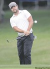 Chuck Burton / The associated Press
Ryan Moore: late birdie binge