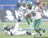 DAVID LIPNOWSKI / WINNIPEG FREE PRESS
Ouch! Rider Lance Frazier evades Bomber Terrence Edwards during the second half of the Banjo Bowl at Canad Inns Stadium Sunday.