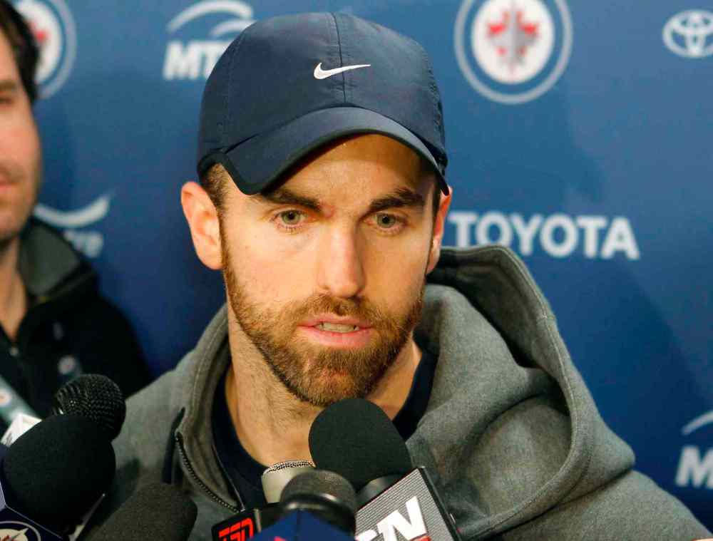 BORIS MINKEVICH / WINNIPEG FREE PRESS
'Hopefully the two guys coming here are excited to be a part of a playoff run and help us try to get some wins,' Captain Andrew Ladd said today after the trade announcement.