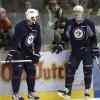 JOE BRYKSA / WINNIPEG FREE PRESS
Winnipeg Jets Dustin Byfuglien, left, with teammate Mark Scheifele, is back as a forward at practice today at the Iceplex.