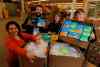 BORIS MINKEVICH/WINNIPEG FREE PRESS
Winnipeg Harvest's Rosa Martinez, Jason Booth, Lauren Rist and Duncan Stokes show off some of 20 boxes of donated products.