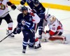 BORIS MINKEVICH / WINNIPEG FREE PRESS
Dustin Byfuglien and Adam Lowry try to get the puck past Senators goalkeeper Andrew Hammond in first period action at the MTS Centre Wednesday night.