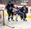 Phil Hossack / Winnipeg Free Press
Winnipeg Jets' Drew Stafford (12), Montreal Canadiens' Andrei Markov (79) and Jets' Blake Wheeler (26) follow the puck's lead in first period action Thursday evening at the MTS Centre.