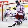 Phil Hossack / Winnipeg Free Press
New York Rangers Chris Kreider celebrates after scoring the game-winning goal Tuesday. He and the puck wound up in the net behind Ondrej Pavelec late in the third period.