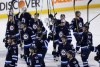 TREVOR HAGAN / WINNIPEG FREE PRESS
The Winnipeg Jets' salute the crowd after losing to the Anaheim Ducks.