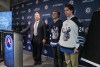 Mike Deal / Winnipeg Free Press
Winnipeg Jets GM Kevin Cheveldayoff introduces Manitoba Moose players Scott Kosmachuk (right) and JC Lipon who are modelling the new jersey for the Winnipeg Jets affiliate AHL team.
