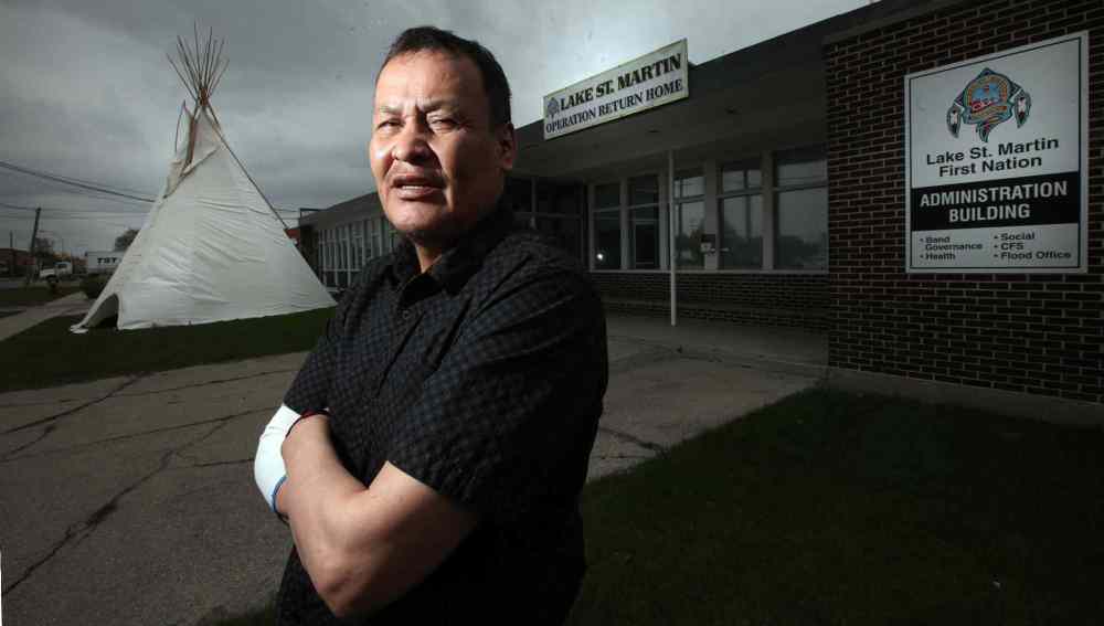 PHIL HOSSACK / WINNIPEG FREE PRESS
Lake St. Martin Chief Adrian Sinclair, at the band's Winnipeg office, says: 'Give us our community back before we're all assimilated. We're not begging. We're asking for what's rightfully ours.'