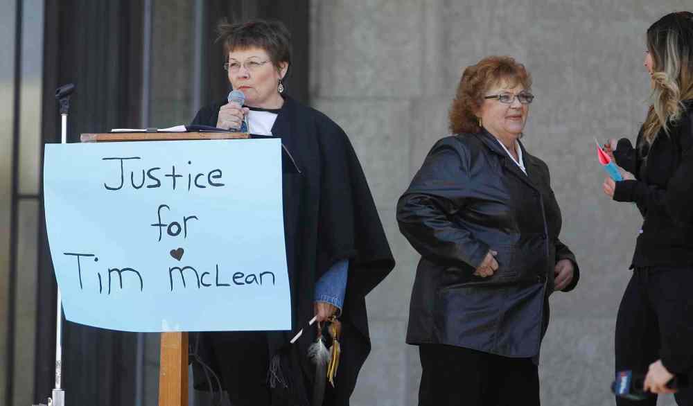 TREVOR HAGAN / WINNIPEG FREE PRESS
Carol de Delley, mother of Tim McLean (top left), speaks at a Saturday rally organized by a group led by Ginny Kirk.