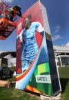 JOE BRYKSA / WINNIPEG FREE PRESS 
FIFA Women's World Cup banners go up outside Investors Group Field on Friday.
