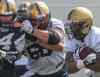 MIKE DEAL / WINNIPEG FREE PRESS
Dominic Picard (centre) tries to control Zach Anderson (left) during training camp Monday.