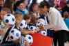 JOHN WOODS / WINNIPEG FREE PRESS
Christen Press of Team USA greets youth soccer teams who came to support the Americans as they arrived in Winnipeg for the Women’s World Cup.