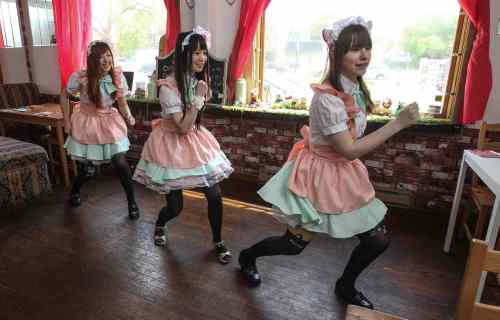 MIKE DEAL / WINNIPEG FREE PRESS
Dwarf no Cachette, a Japanese restaurant that incorporates cos-play, anime and japanese subculture into its offerings. Tuesdays is Maid Cafe day at the restaurant. This is where with a $2.50 ticket you will be served and entertained by the waitresses dressed up in maid costumes. (l-r) Cameron Foy as Melon, Christina Xue as Sakura (Cherry) and Ashley Wakely as Ichigo (Strawberry).