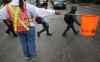MIKE DEAL / WINNIPEG FREE PRESS
A crossing guard has started a Facebook group to list plate numbers of people who drive dangerously at a West End intersection.