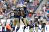 Ruth Bonneville / Winnipeg Free Press
Winnipeg Blue Bombers #90 Greg Peach and #14 Lin-J Shell celebrate the second touchdown of the game just seconds before halftime at the stadium Friday.