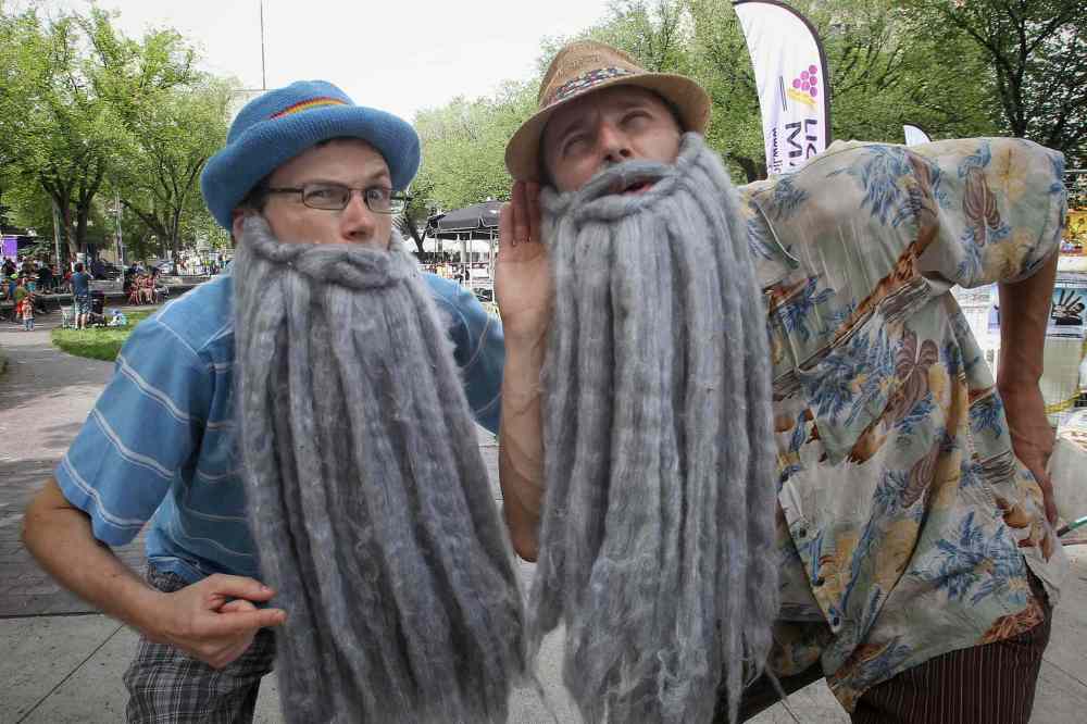 Craig Bednar (left) and Josh Logan dressed as grandparents promote their show Kids vs City which will be at #10 venue during the Winnipeg Fringe Theatre Festival. MIKE DEAL / WINNIPEG FREE PRESS