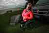 Janis Ollson poses near her cottage beside Lake Winnipeg. Victoria Beach will not allow the handicapped woman vehicle access to their beach for her kid's swimming lessons. (Phil Hossack / Winnipeg Free Press)