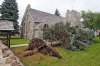 Mike Deal/Winnipeg Free Press
A large spruce tree lies beside the St. Mary’s Anglican Church in Virden on Tuesday following a monster storm Monday night.